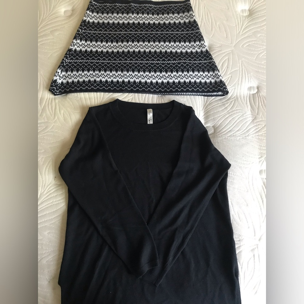 Black long sleeve Sweater size large (8-10)